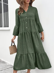 Tiered midi dress in olive green cotton blend with button front, V-neck, and bell sleeves.