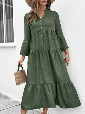 Tiered midi dress in olive green cotton blend with button front, V-neck, and bell sleeves.