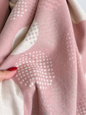 Dusty pink textured scarf with white polka dot pattern and subtle metallic threads