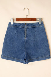 Denim wrap skort in medium wash with zip closure and patch pockets