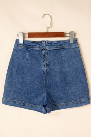 Denim wrap skort in medium wash with zip closure and patch pockets