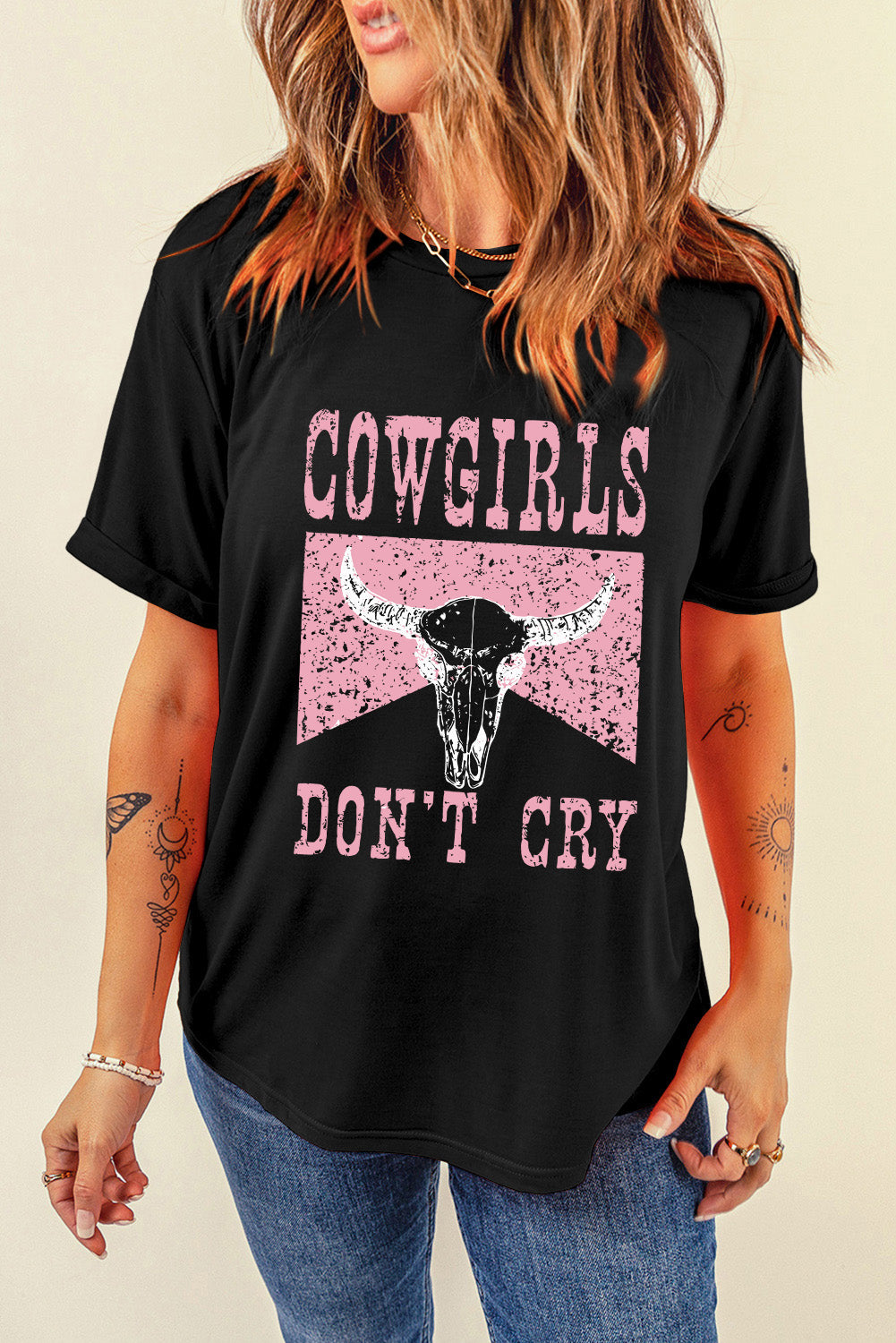 Black graphic tee with distressed cowgirl skull and text print