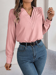 Dusty Pink V-neckline blouse with pleated detail and long sleeves.