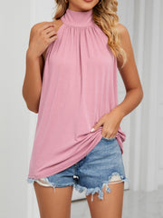 Blush pink ruched high neck cami with tie back detail.