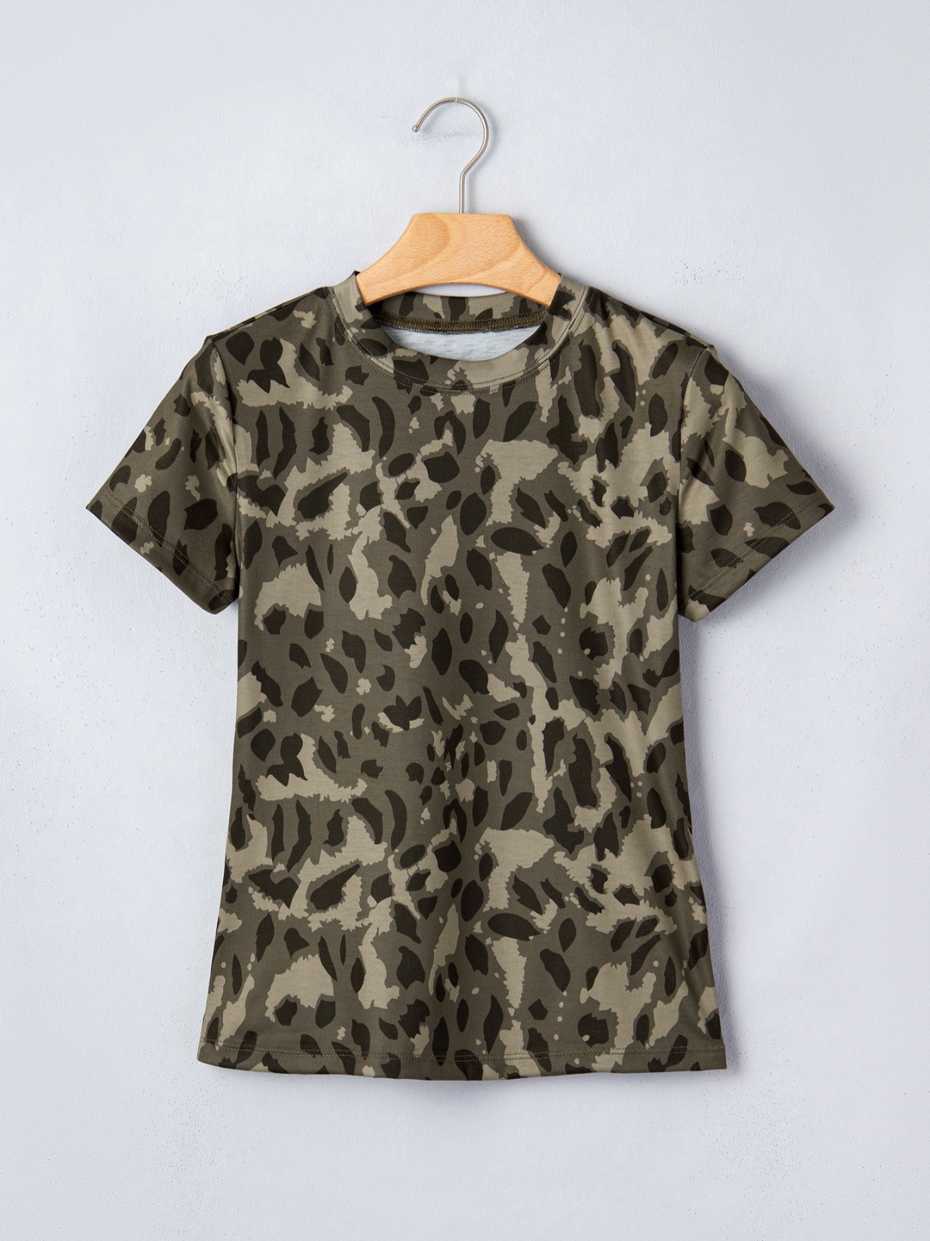 Sleek mock neck tee with allover abstract leopard print in olive green and tan.