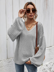 Light Gray open-knit sweater with V-neck and balloon sleeves.