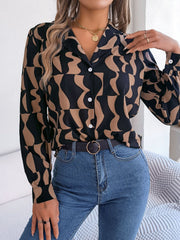 Black and tan abstract wave print silk-touch blouse with button front and collar.
