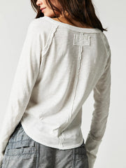 White long sleeve tee with distressed neckline and back seam detail