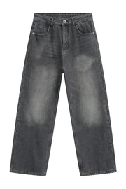 Faded dark gray cotton denim jeans with a wide-leg silhouette and a casual, basic style.