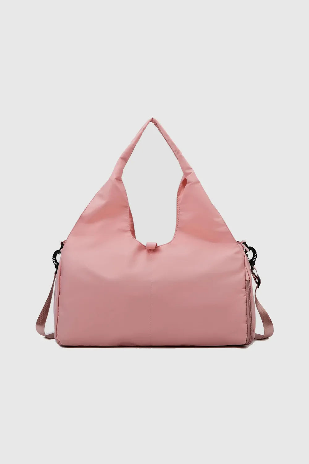 Dusty Pink duffel bag with dual handles and a crossbody strap, perfect for gym or travel.