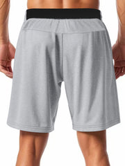 Light gray chino shorts with drawstring waist and black elastic band.