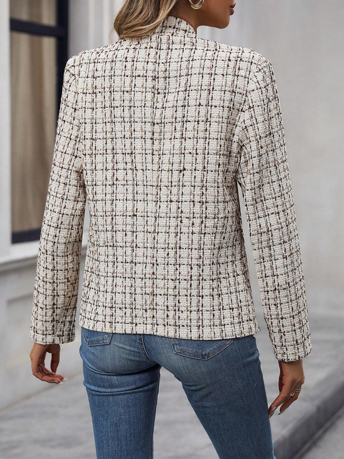 Textured tweed open-front blazer in beige with a plaid pattern, long sleeves, and a classic cut.