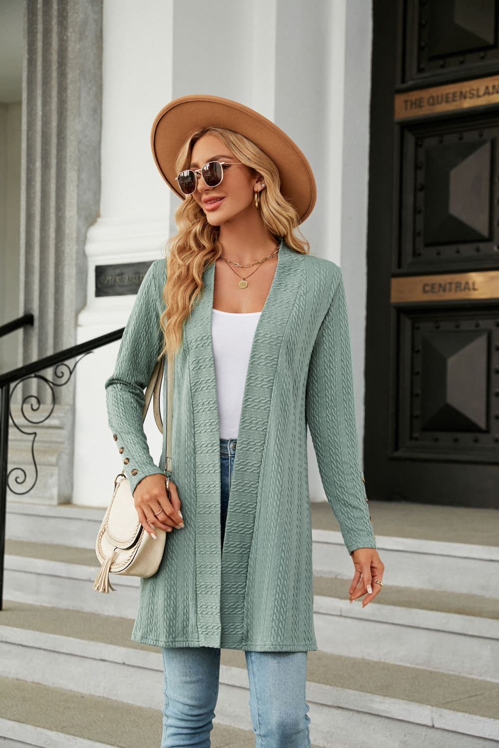 Sage textured knit open-front duster cardigan with button detail on sleeves.