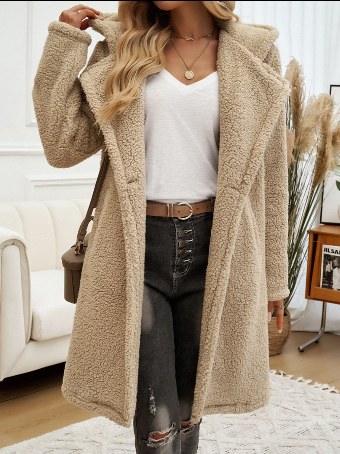 Camel teddy hooded cocoon coat with a relaxed fit and plush texture.