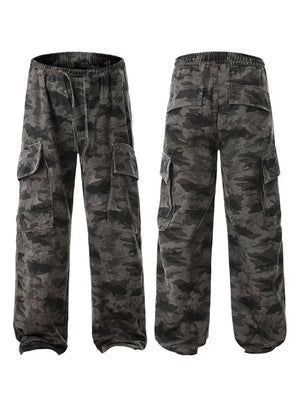 Urban camouflage cargo sweatpants in cotton with drawstring waist and multiple pockets.