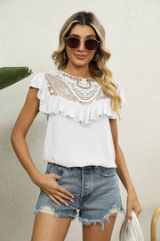 White lace yoke ruffle sleeve blouse with short sleeves.