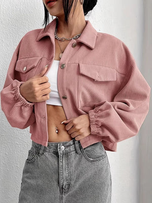 Pale blush corduroy blouson jacket with cropped length and elastic cuffs.