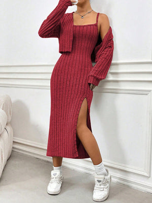 Orange-red ribbed knit midi dress with a high slit and matching cropped cardigan.