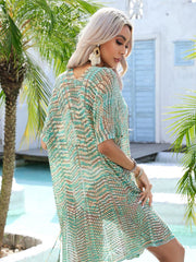 Openwork knit beach cover-up in green and brown chevron pattern with tassels.