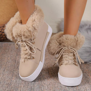 Apricot fluffy cuff round-toe platform boots with white soles and laces.
