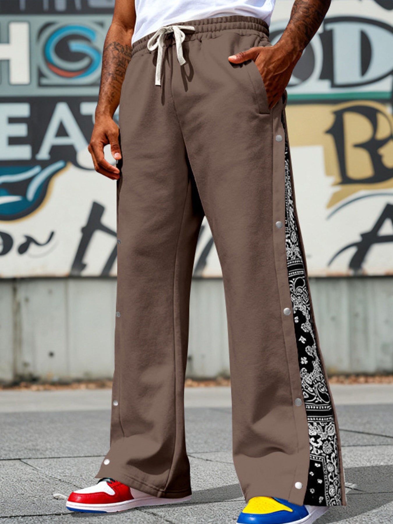 Dark Brown sweatpants with wide legs, side snaps, and bandana print panels.