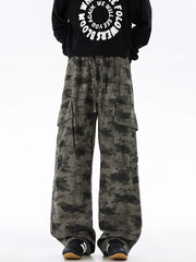 Urban camouflage cargo sweatpants with drawstring waist and multiple pockets.