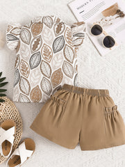 Baby girl leaf print bow top with ruffled sleeves and camel shorts with ruffled pockets.