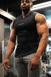 Black performance tank top with subtle logo detail on chest