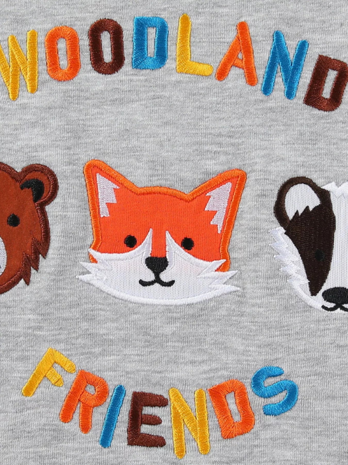Gray sweatshirt with embroidered woodland animals and text.