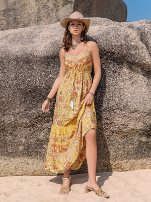 Yellow tiered cami maxi dress with floral print and tassel detail