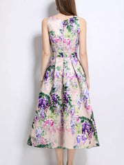 Blush pink a-line midi dress with wisteria floral print, sleeveless, and pleated skirt.