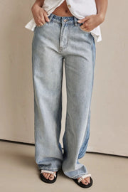 Panelled wide-leg denim trousers in light wash with contrast stitching and a relaxed fit.