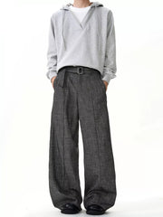 Men's charcoal wide leg sweatpants with belt loops and a buckle belt.