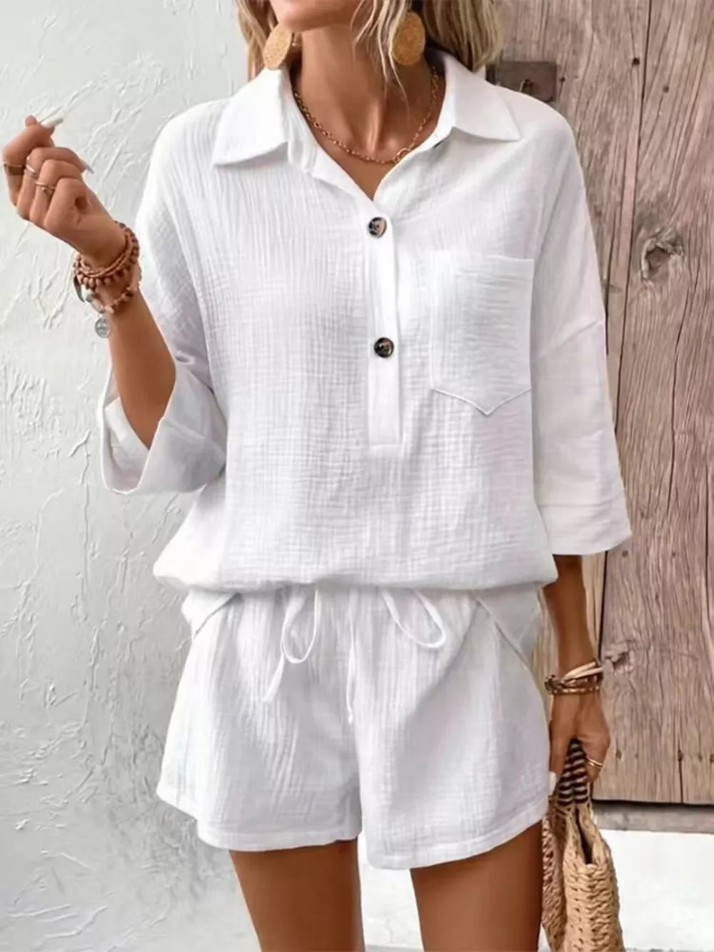 White cotton two-piece set with button-up shirt and drawstring shorts