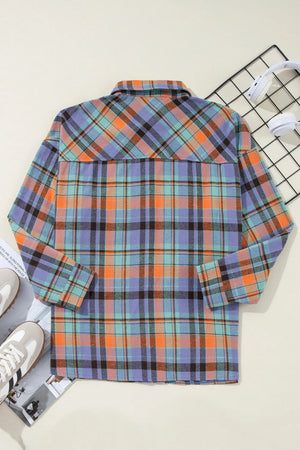 Oversized plaid shacket with button-down collar in orange and purple check.