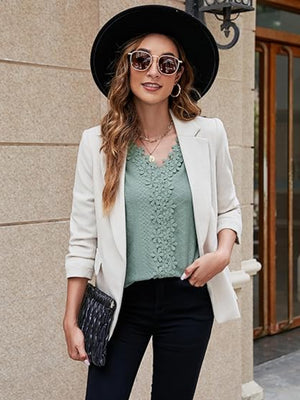 Sage floral embroidered eyelet blouse with V-neck and ruffle cuffs