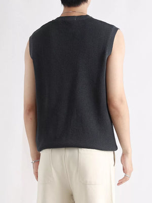 Men's dark gray textured knit quarter-zip tank top, sleeveless with crew neck.