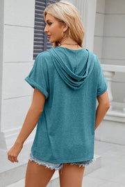Turquoise Henley hooded tee with rolled short sleeves and a casual fit.