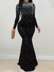 formal gown in black featuring rhinestone and fitted fit