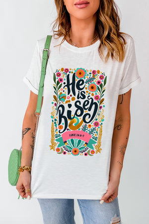 White t-shirt with embroidered floral verse "He is Risen" and Luke 24:6-7