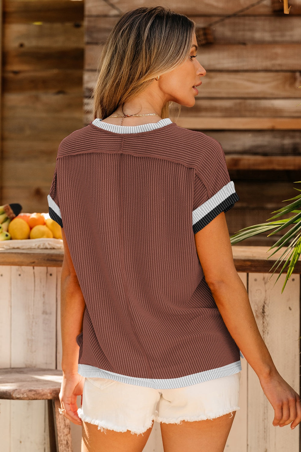 Brown ribbed tee with colorblock trim on sleeves and hem.