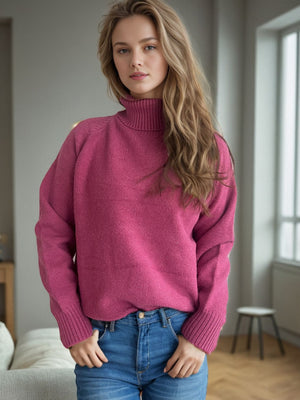 Speckled Donegal turtleneck pullover in cerise acrylic with ribbed cuffs and collar.