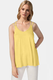 Double strap trapeze cami in light yellow with a V-neck.