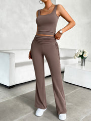 Taupe ribbed ruched waist tank and flare pants set with drawstring details.