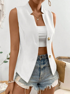 White button-down vest with sculpted lapels and gold buttons, styled with a crop top and denim shorts.