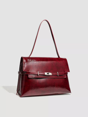 Elegant red pu leather shoulder bag with silver buckle detail
