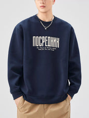 Navy blue oversized sweatshirt with white graphic text and crew neck.