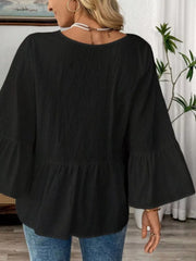 Black cotton V-neck blouse with bell sleeves and peplum hem