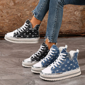 Lace-up high-top platform sneakers in black and blue canvas with rhinestone trim.