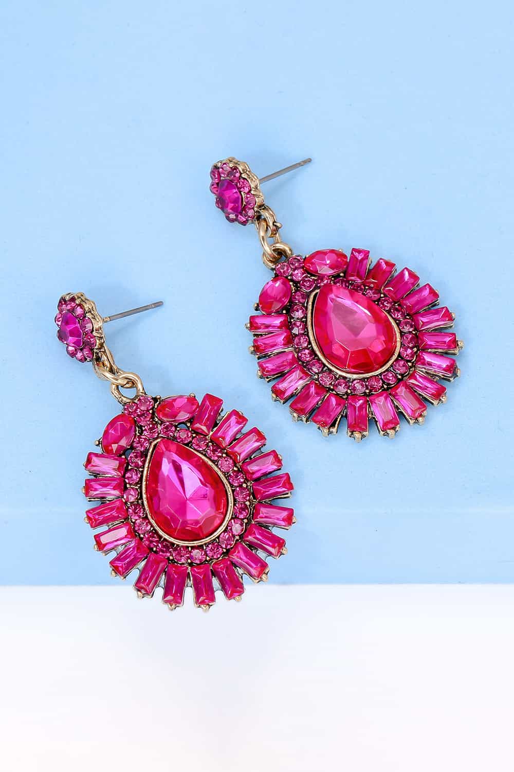 Hot Pink Gemstone Burst Dangle Earrings with gold accents and stud backs.
